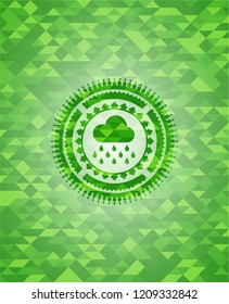rain icon inside green emblem. Mosaic background