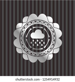 rain icon inside silvery emblem