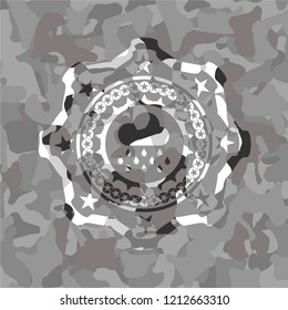 rain icon on grey camouflage texture