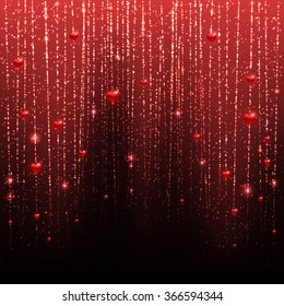 rain from red hearts on a black background