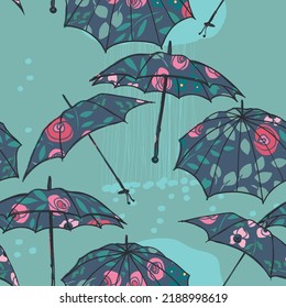 Rain theme seamless pattern with umbrellas and rain drops.