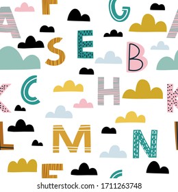 Rainbow and alphabet letters with clouds hand drawn seamless vector fill. Cute childish drawing. Baby wrapping paper, textile, vector illustration 
