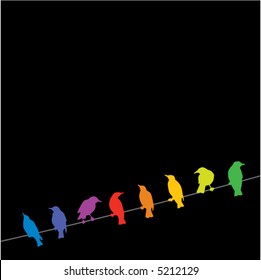 A rainbow of birds on a wire against a black background