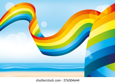 Rainbow in the blue sky over the beach
