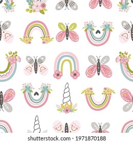 Rainbow and butterfly whimsical baby and nursery seamless pattern design in cute hand drawn vector style for fabric, textile, wallpaper