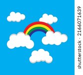 Rainbow with clouds on blue background Free Vector