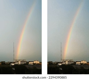 Un arco iris en el cielo nublado en el vector de la ciudad