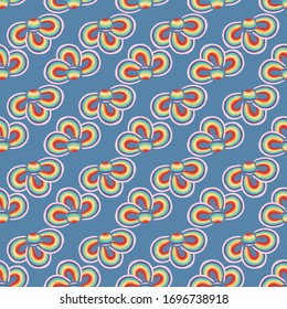 Rainbow clover shapes seamless vector pattern. Colorful surface print design. For fabrics, stationery and packaging.