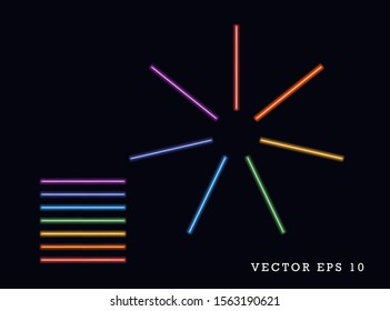 Rainbow colored abstract neon glow sticks in the shape of a sun on a dark background. Isolated background.