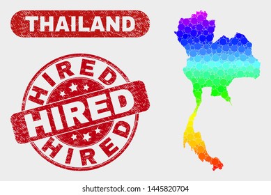 Rainbow colored dot Thailand map and seal stamps. Red rounded Hired distress watermark. Gradient rainbow colored Thailand map mosaic of scattered small spheres. Hired seal with rubber texture.