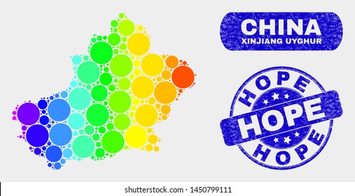 Rainbow colored dot Xinjiang Uyghur Region map and seal stamps. Blue rounded Hope grunge seal stamp. Gradient rainbow colored Xinjiang Uyghur Region map mosaic of random spheric dots.
