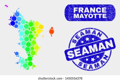 Rainbow colored dotted Mayotte Islands map and stamps. Blue round Seaman scratched seal stamp. Gradient rainbow colored Mayotte Islands map mosaic of randomized round elements.