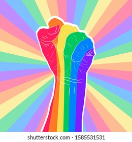 Rainbow colored hand with a fist raised up on a rainbow background. Gay Pride. LGBT concept. Sticker, patch, t-shirt print, logo design.