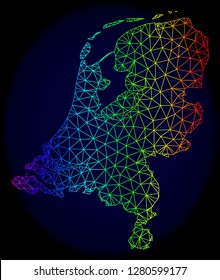 Rainbow colored mesh vector map of Netherlands isolated on a dark blue background. Abstract lines, triangles forms map of Netherlands. Carcass model for patriotic illustrations.