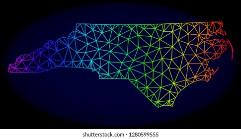 Rainbow colored mesh vector map of North Carolina State isolated on a dark blue background. Abstract lines, triangles forms map of North Carolina State. Carcass model for patriotic purposes.