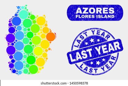 Rainbow colored spotted Flores Island of Azores map and seal stamps. Blue round Last Year grunge seal stamp. Gradient rainbow colored Flores Island of Azores map mosaic of randomized small spheres.