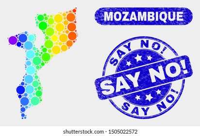 Rainbow colored spotted Mozambique map and stamps. Blue round Say No! scratched seal stamp. Gradiented rainbow colored Mozambique map mosaic of random round dots. Say No! seal with scratched texture.