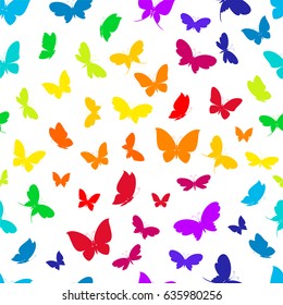 Rainbow colorful silhouettes of butterflies on a white background seamless pattern. 