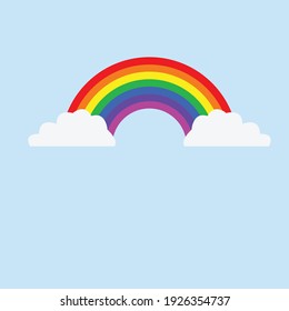 rainbow covered by clouds in blue sky