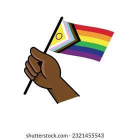 Rainbow flag. Brown dark skin hand holding lgbt flag. Pride month. Diversity representation.