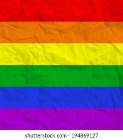 Rainbow flag on crumpled paper