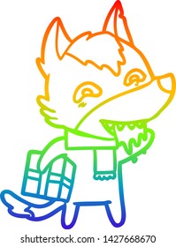 Regenbogen-Farbverlauf-Zeichnung eines Cartoon hungrigen Wolf, der Weihnachtsgeschenk hält