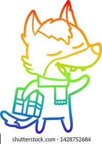 rainbow gradient line drawing of a cartoon wolf with christmas present laughing