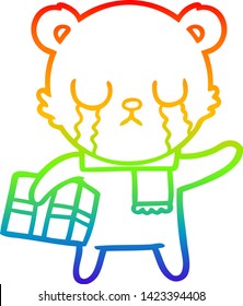 rainbow gradient line drawing of a crying polar bear cartoon with christmas gift