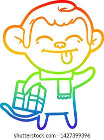 rainbow gradient line drawing of a funny cartoon monkey with christmas present