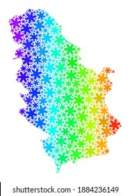 Rainbow gradient mosaic of Serbia map done for Christmas holidays. Serbia map mosaic is designed of bright snow parts. Designed for Winter illustrations.