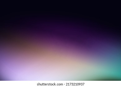 Rainbow highlights on a black background.Glare or reflection from water and glass.Glittering  particles for social media backgrounds, product presentations, photo shots.