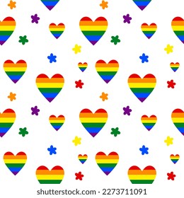 Rainbow LGBT hearts and colorful flowers in a seamless pattern