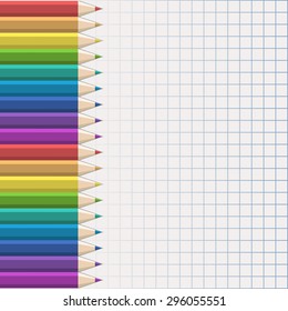 rainbow on sheet of paper - a palette of colorful pencils for drawing on a checkered sheet of notebook