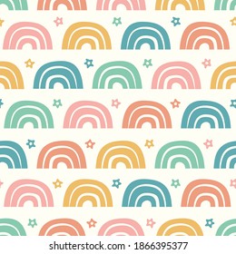 Rainbow pattern design. Cute vector seamless repeat background of colourful rainbows and stars. 