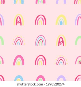 Rainbow pattern design for kids nursery - funny hand drawn doodle, seamless pattern. 