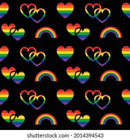rainbow pride seamless pattern with hearts and rainbows on black background