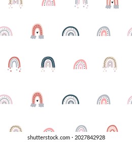 Rainbow seamless pattern. Kids vector background with colorful rainbows on the white backdrop