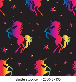 Rainbow unicorns and stars on black background. Seamless pattern. Vector illustration.