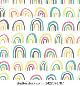 Rainbows lines seamless pattern. Cute wallpaper. Hand drawn vector background. Simple design for fabric, textile print, wrapping.