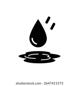 Raindrop Hitting Puddle Causing Ripples on Water Surface Outdoors