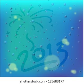 Raindrop on windows glass with foggy drawing firework