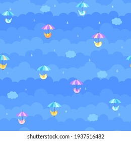 Rainy blue background with cloud and umbrella birds design to seamless pattern