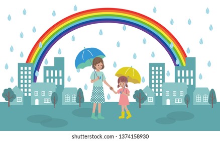 Rainy town and parent and child holding umbrella