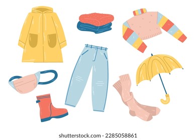 Rainy weather outfit with raincoat, umbrella, jeans, rubber boots, sweater and fanny pack