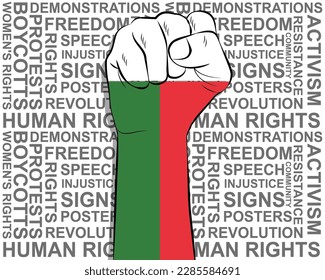 Raised fist on Madagascar flag, political news banner, victory or win concept, Madagascar protest public outrage idea, freedom symbol, punch up, struggle for human rights