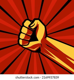 Raised fist on a red background.