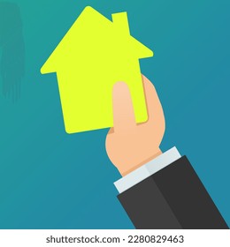 Una mano levantada una tarjeta amarilla en forma de casa con fondo azul (diseño plano)