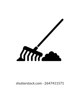 Rake with Pile of Leaves for Autumn Yard Work