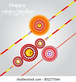 Raksha bandhan greeting card or illustration with beautiful Rakhi.