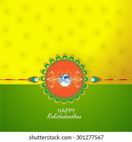 Raksha bandhan greeting card or illustration with beautiful Rakhi.